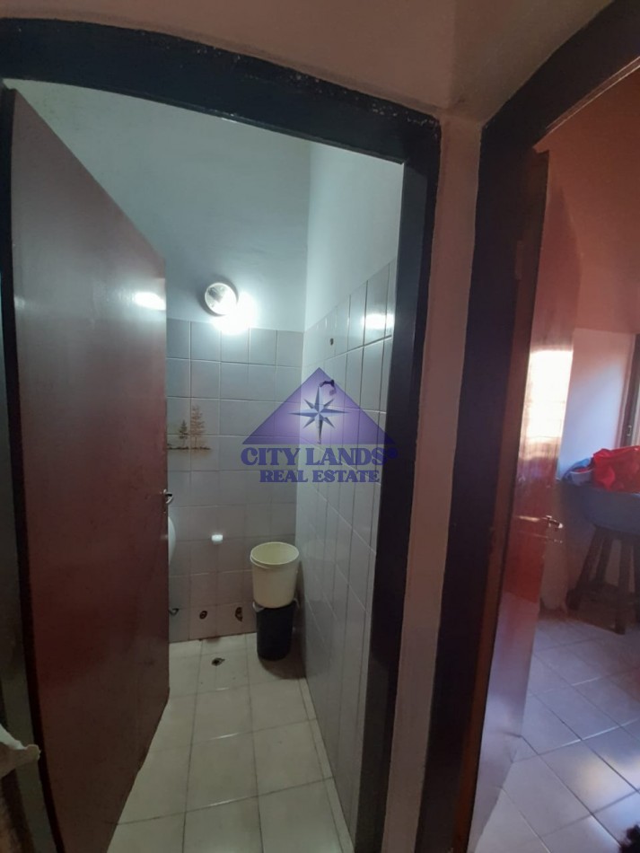 Casa en venta de cuatro dormitorios, bicochera y patio parquizado en la Quinta Seccion-Ciudad de Mendoza